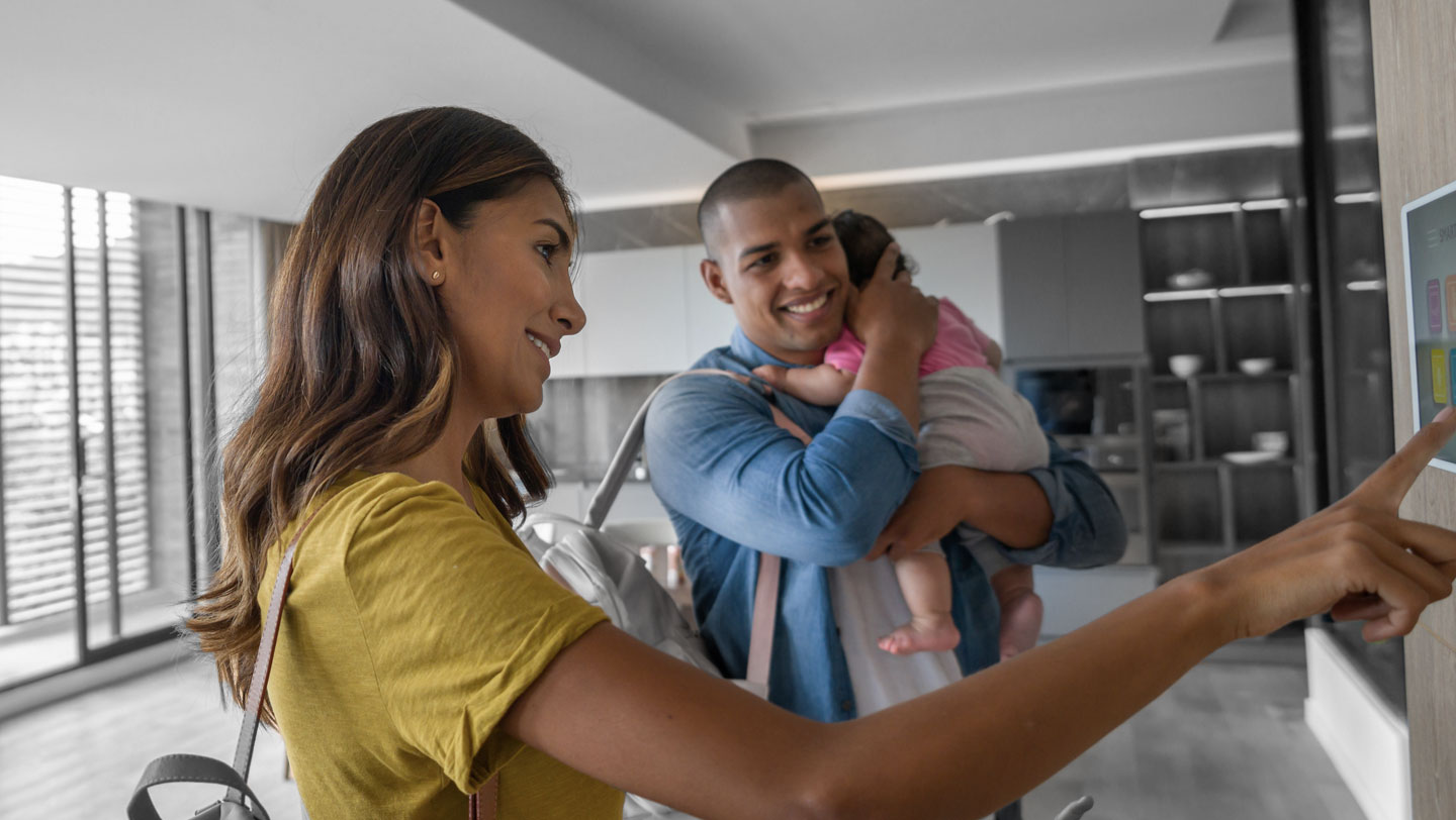 Family using a DFW Security residential alarm system