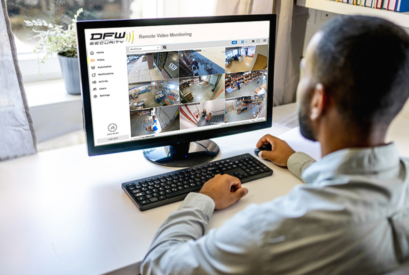 Business owner viewing his security cameras