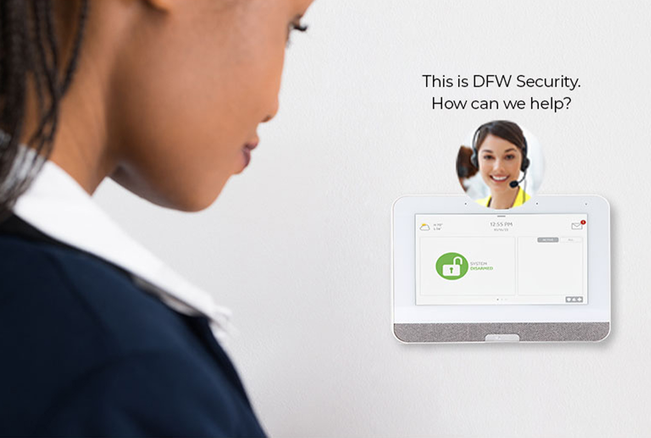 Woman speaking to DFW Security through her alarm keypad