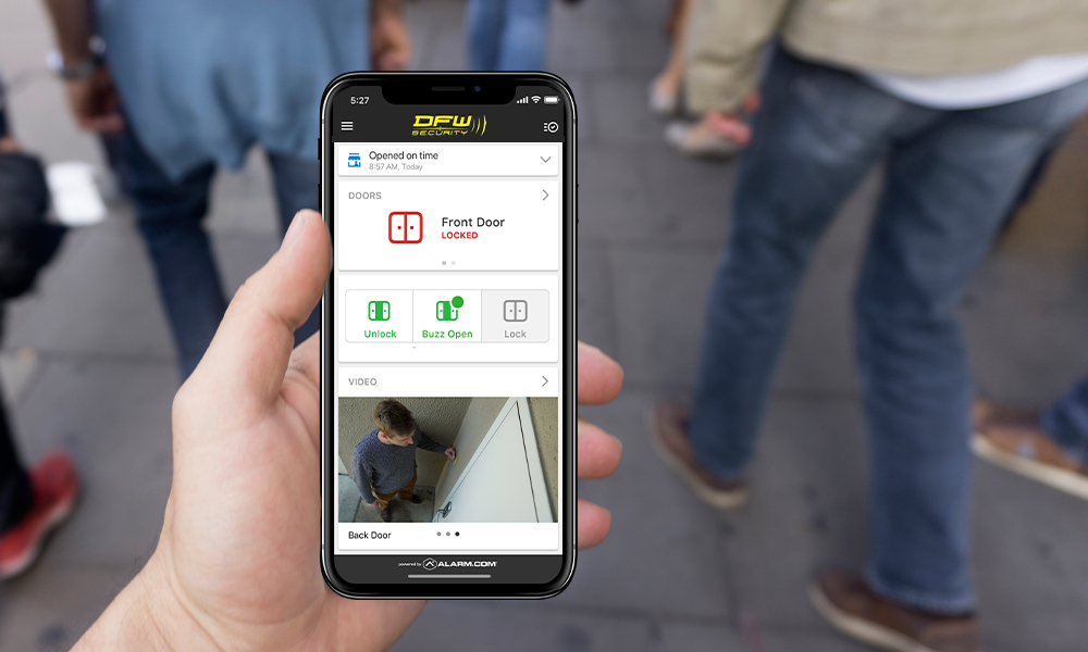 viewing phone with DFW Security app showing access control available actions