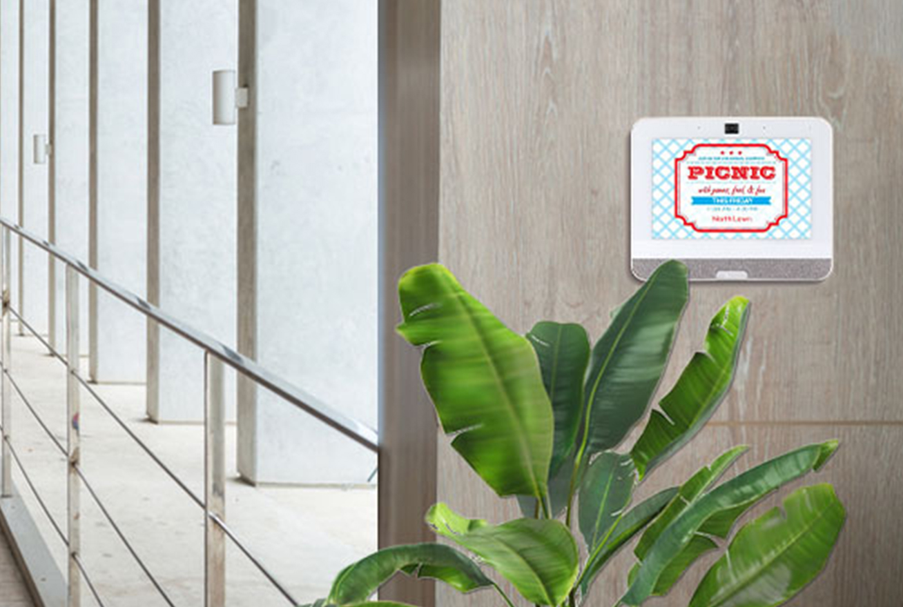 alarm system keypad on wall in business with screen saver