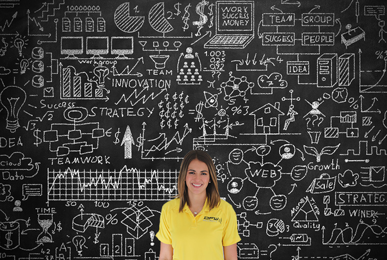 DFW Security employee standing in front of vision chalkboard