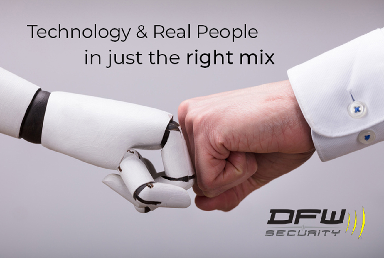 A human hand and robot hand giving a fist bump