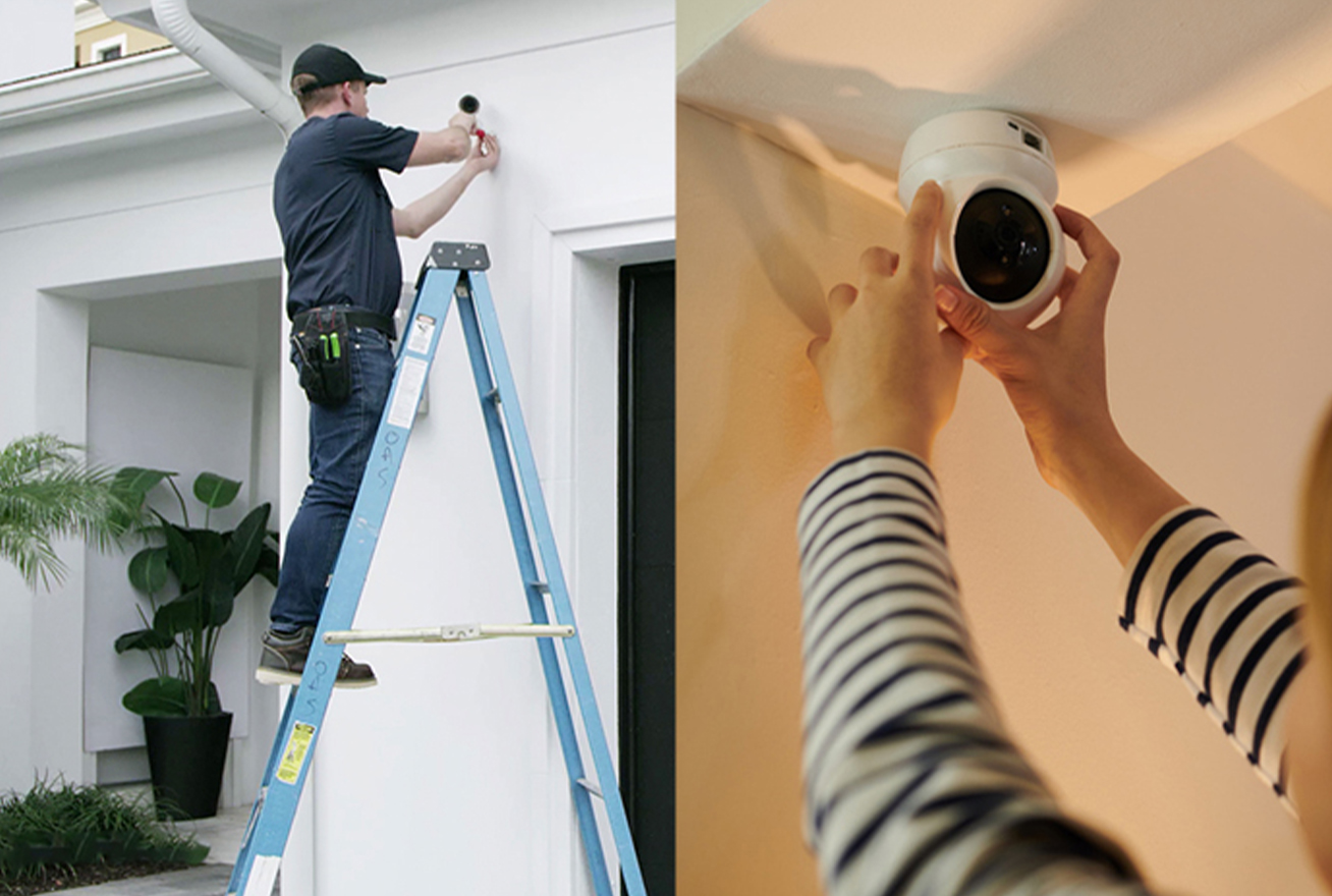 professional alarm installer on a ladder next to home owner adjusting camera