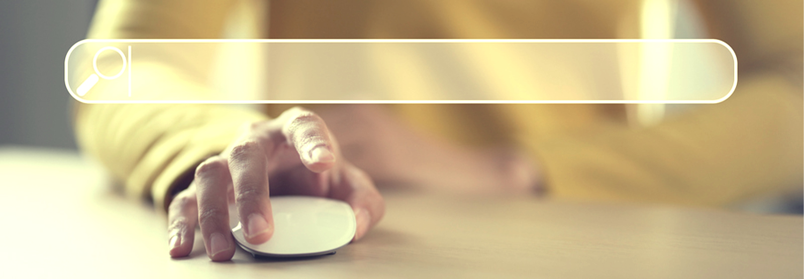 closeup of person using mouse and search box