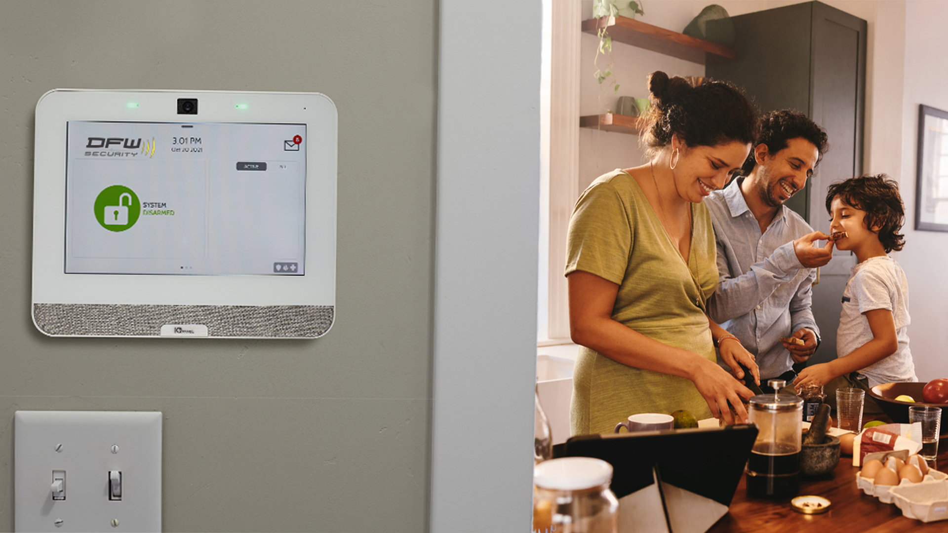 Allen Texas family cooking together in the kitchen with DFW Security system on wall