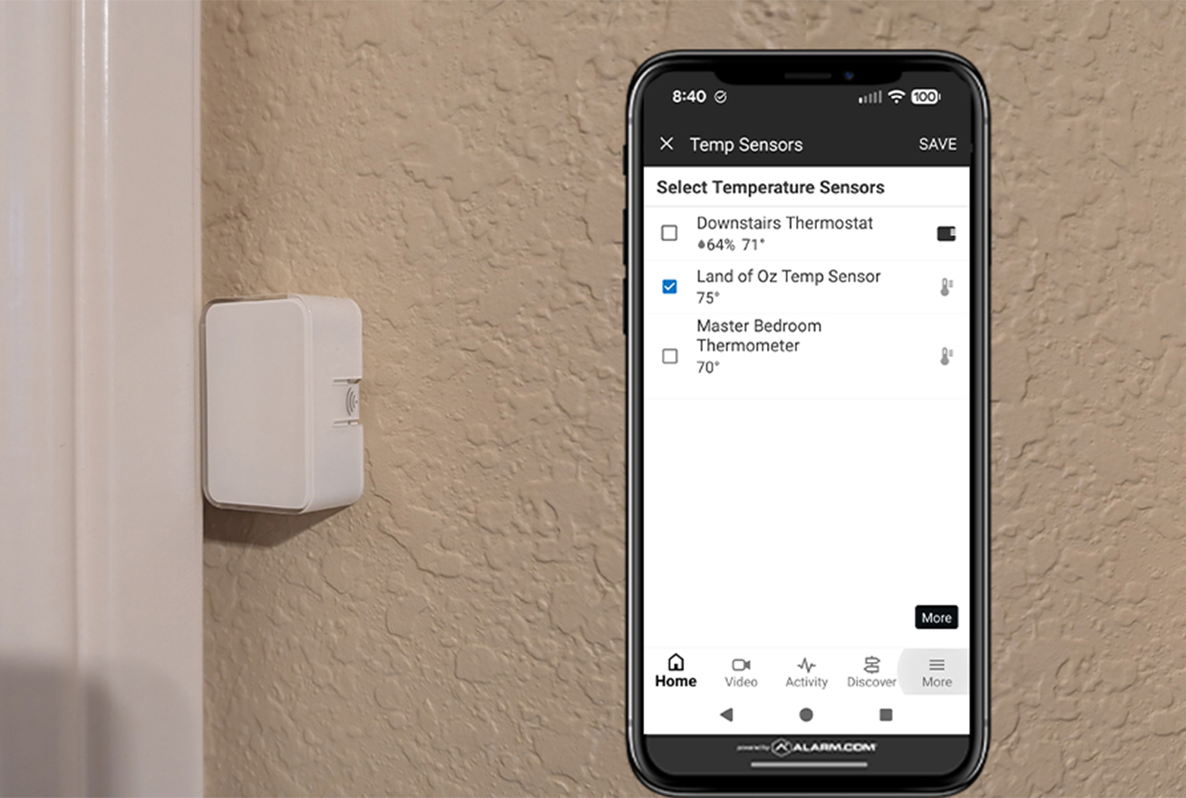 Temperature sensor on wall next to app that controls it