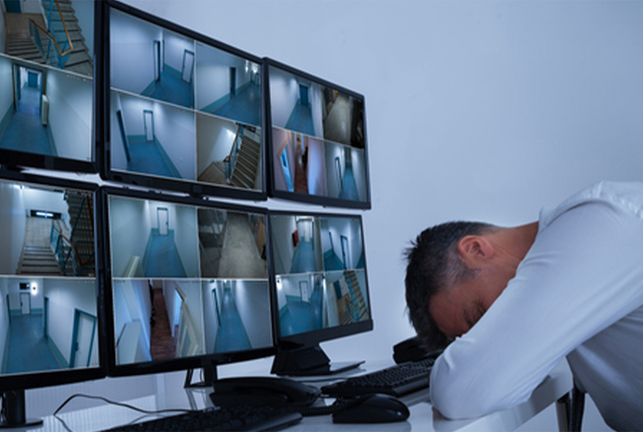 Guard sleeping in front of video camera footage he should be watching