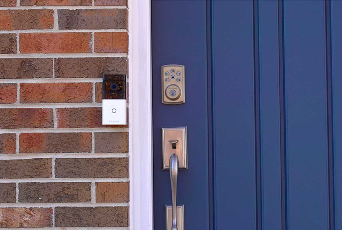 battery powered video doorbell on door