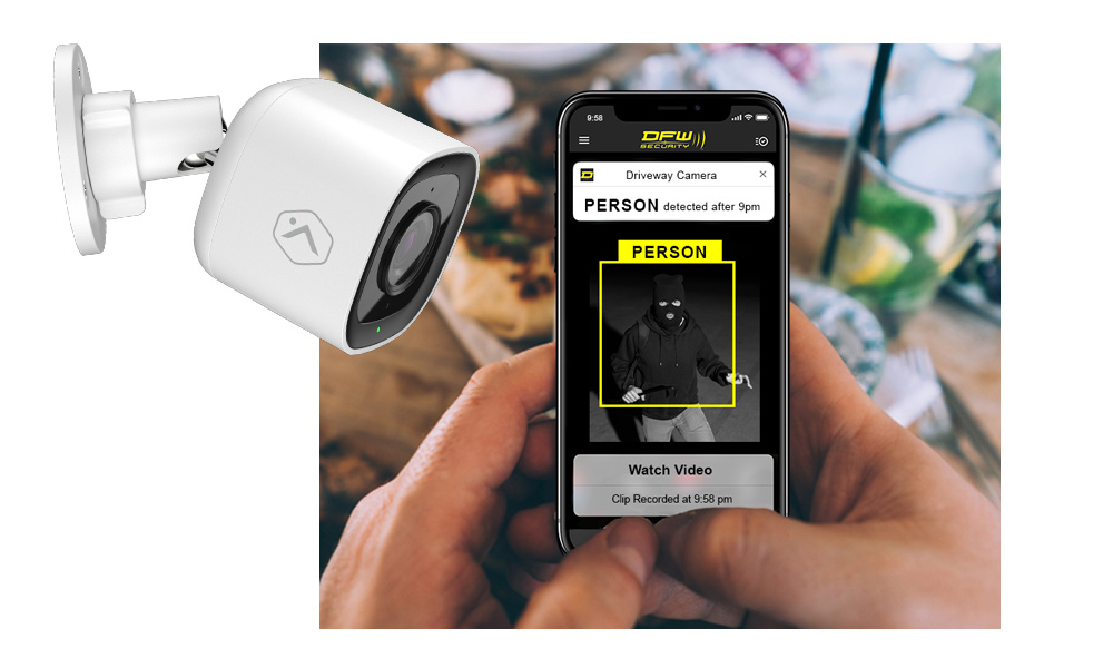 Security Camera with Home Burglar on Phone Screen