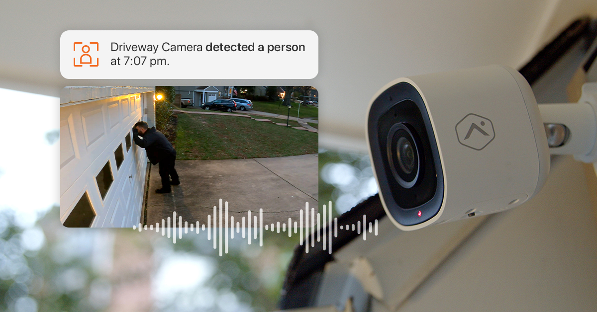 Driveway camera catches man looking in windows