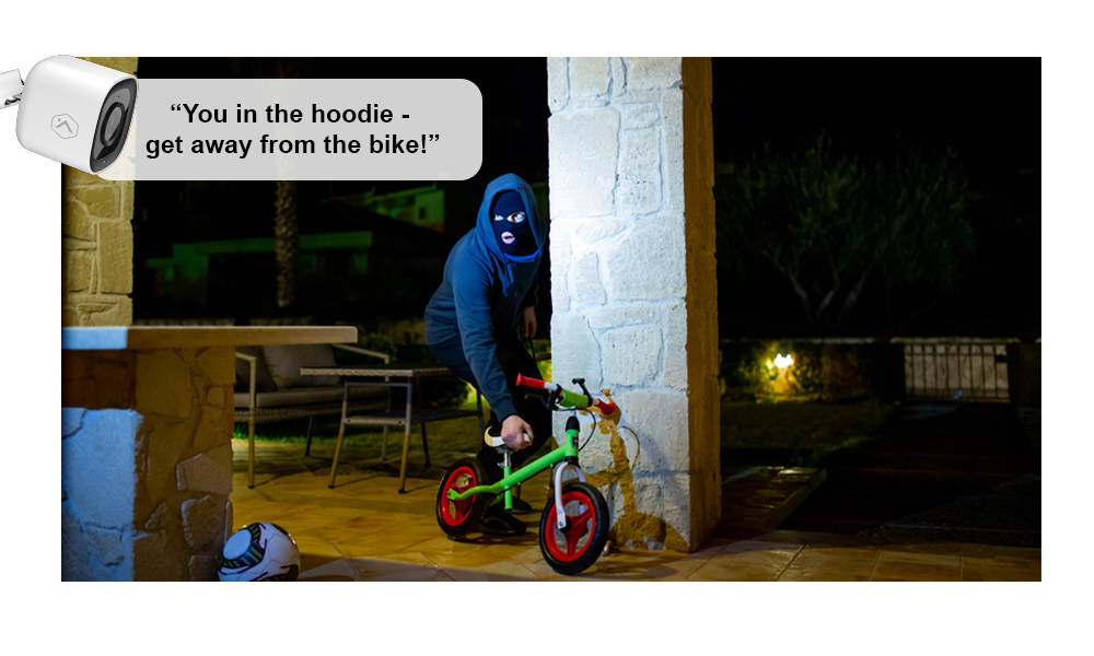 A home security camera using ai deterrence to talk to an intruder