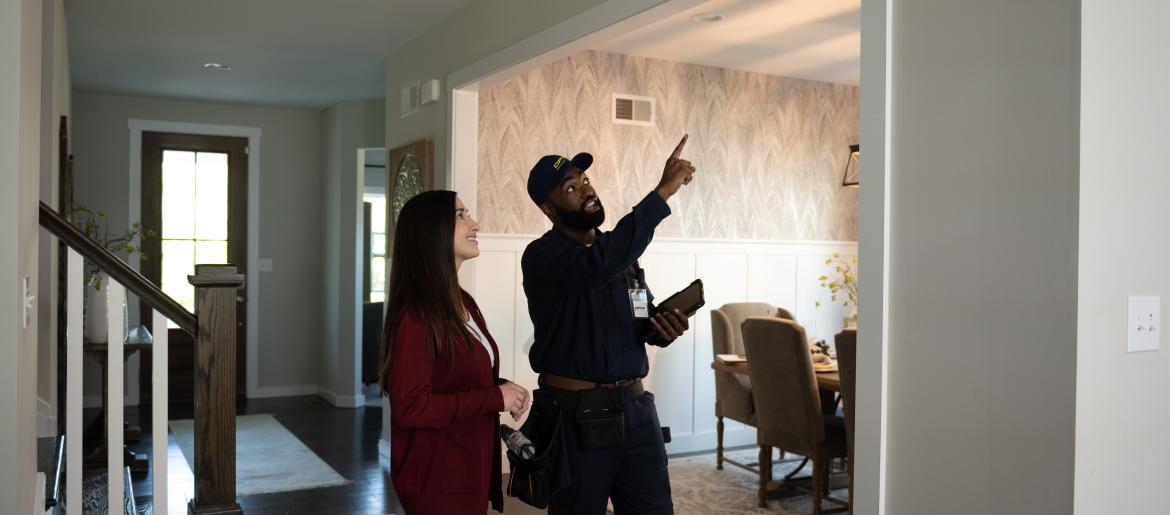 DFW Security Installer Showing Customer Her New Cameras