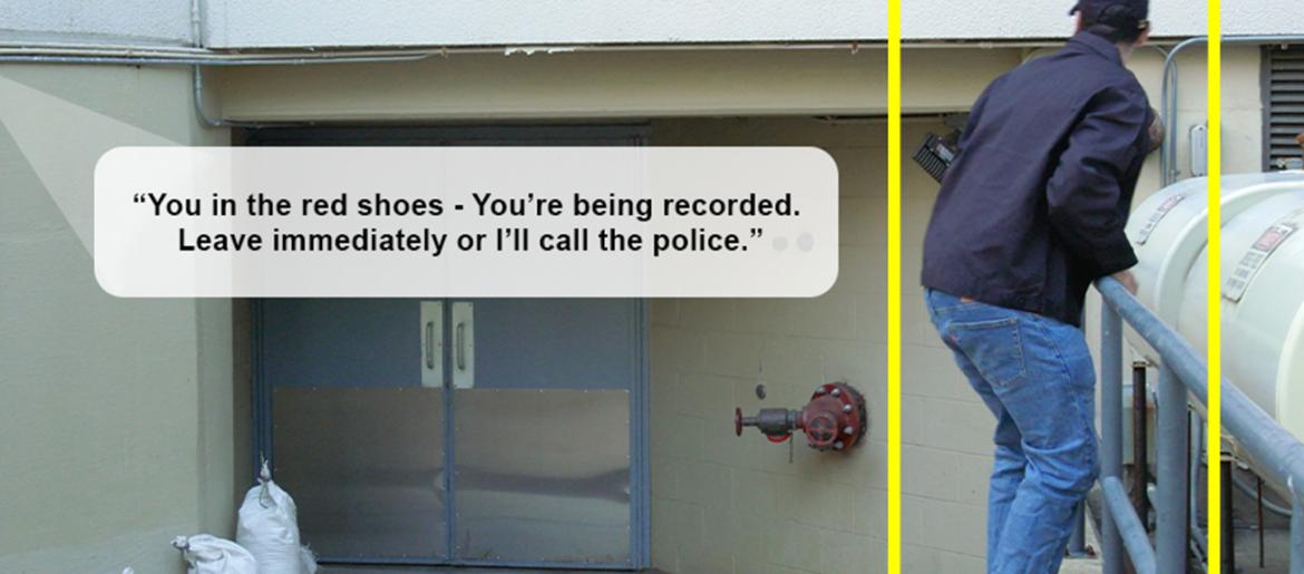 Man lurking by back door is confronted by voice from security camera
