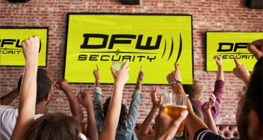 Group cheering for DFW Security as the winner in home security